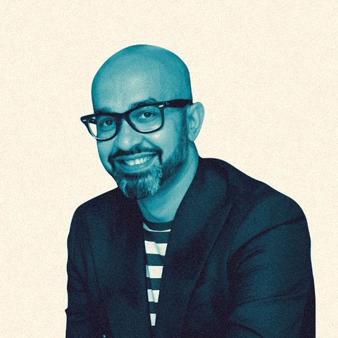 Ferdie Ahmed, Co-Founder of EverGrowth Group, in a navy blazer